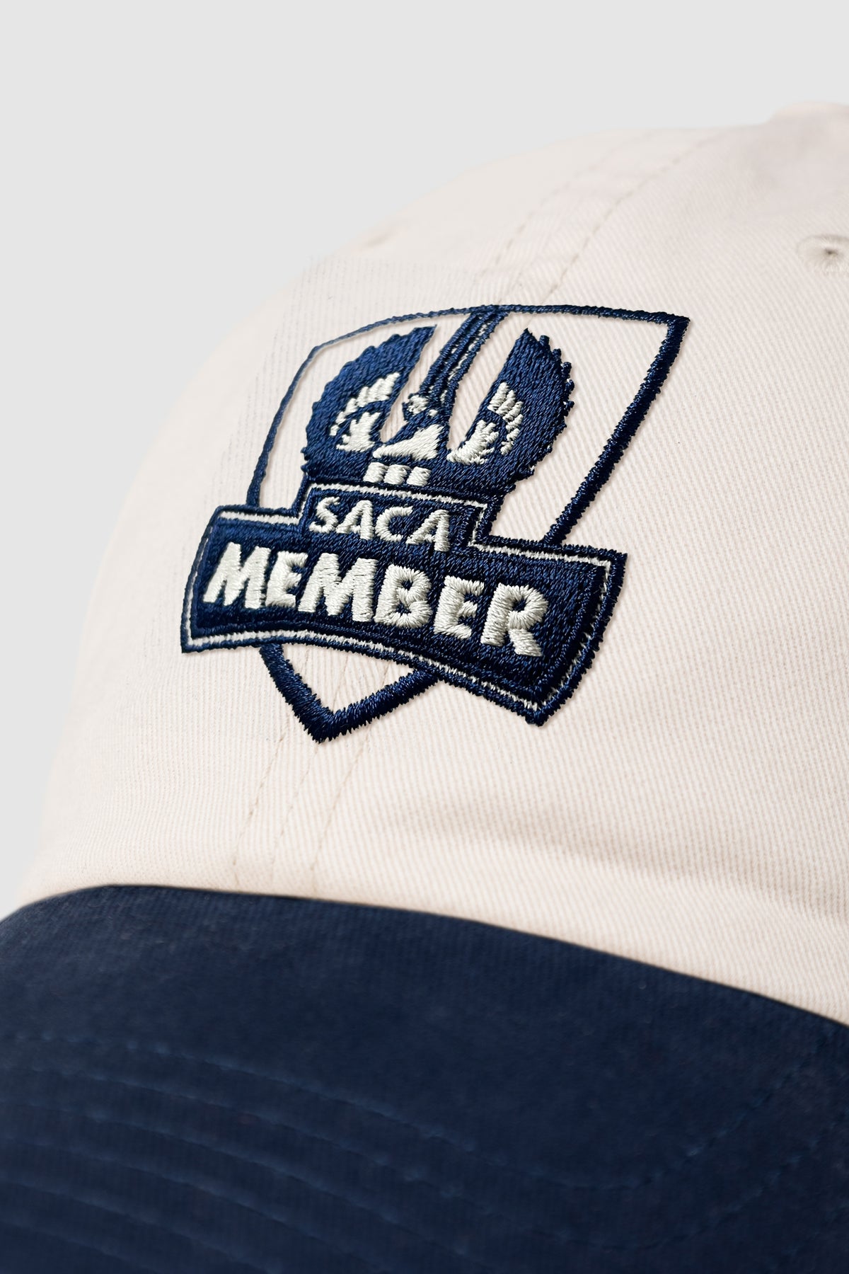 Saca Merchandise Two Tone Embroidered Logo Cap Stone & Navy – SACA Merchandise