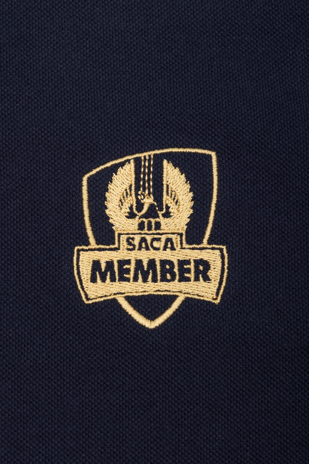 Saca Merchandise Womens Polo Shirt Navy & Gold Emblem – SACA Merchandise