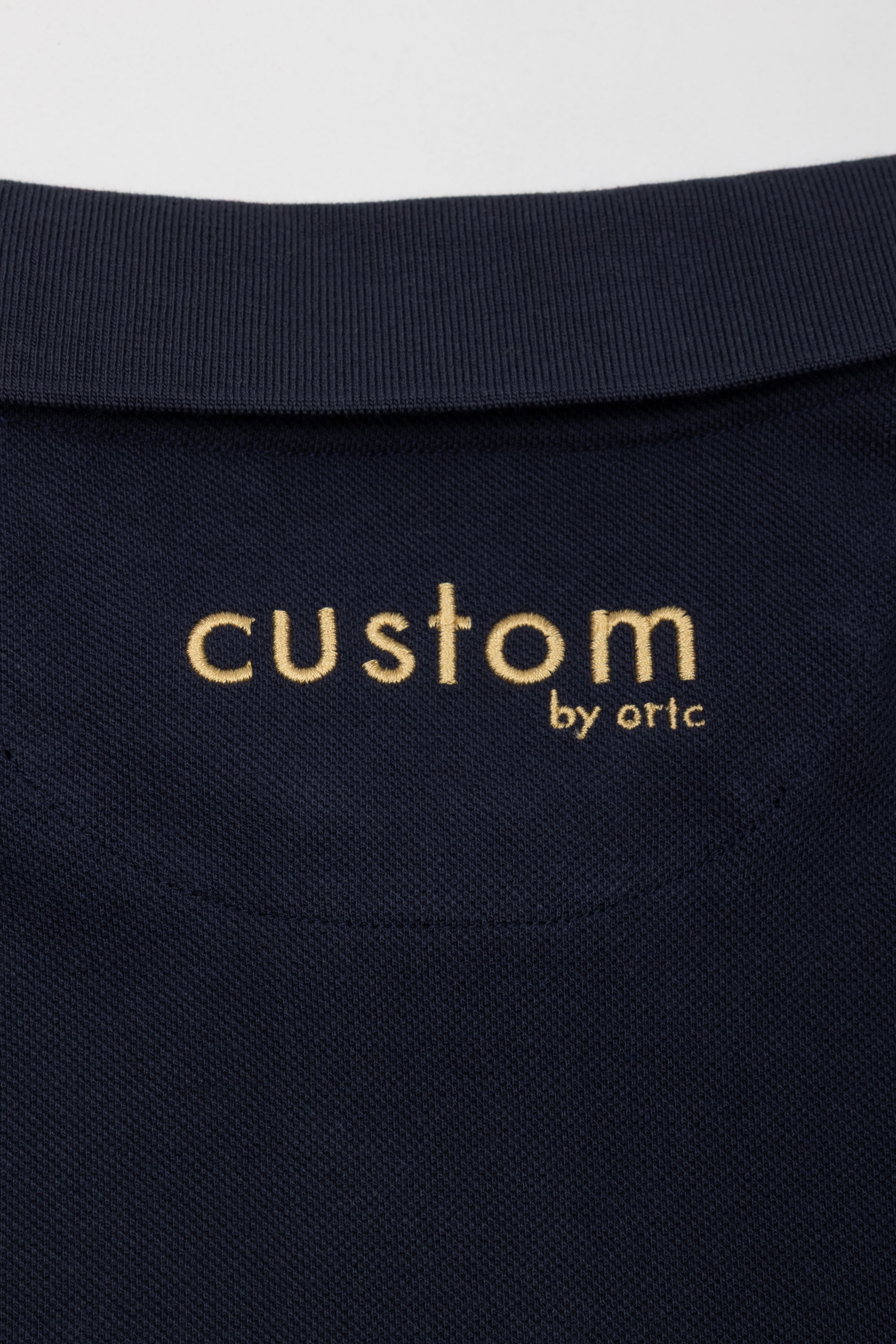 Womens Polo Shirt Navy & Gold Emblem