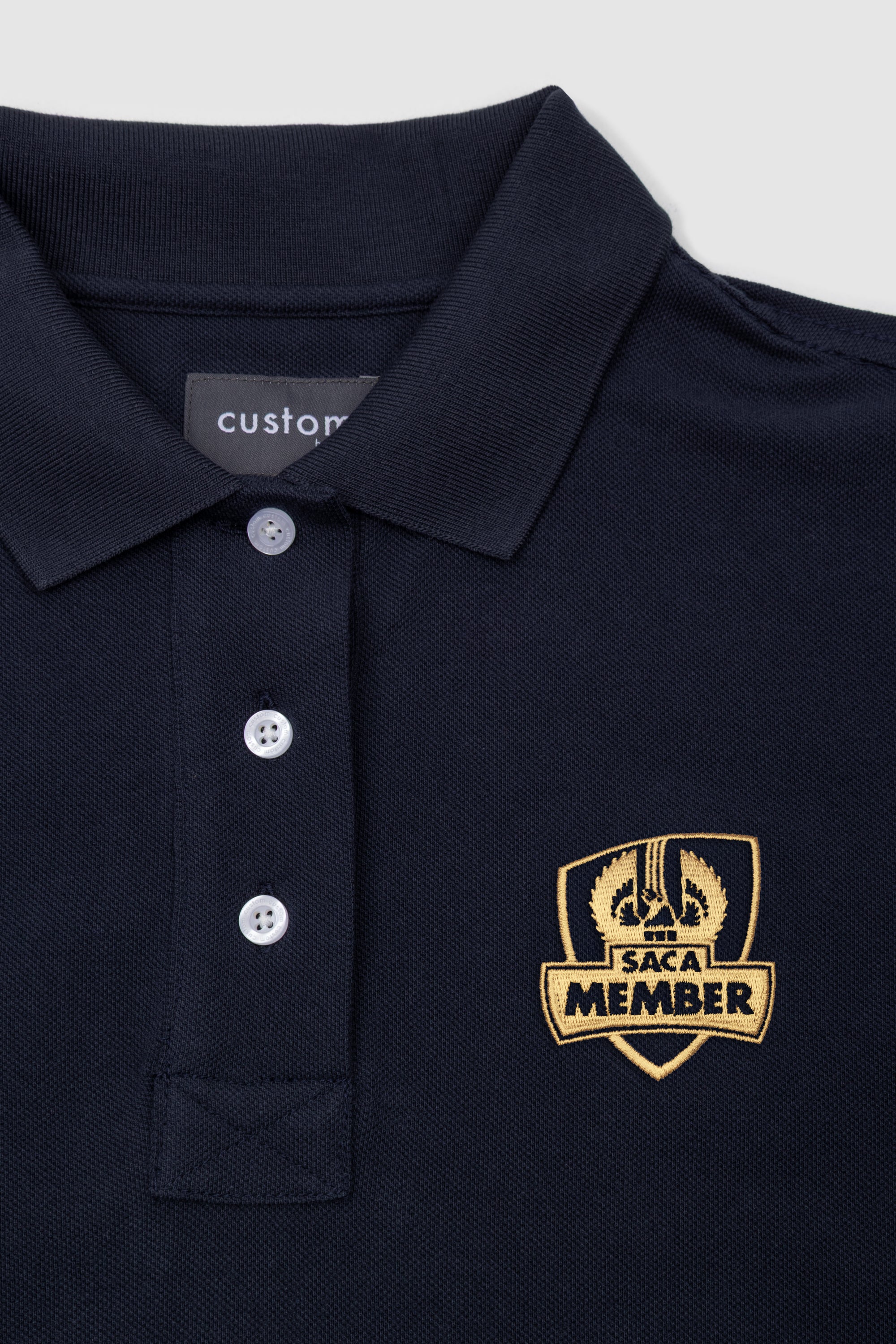 Womens Polo Shirt Navy & Gold Emblem